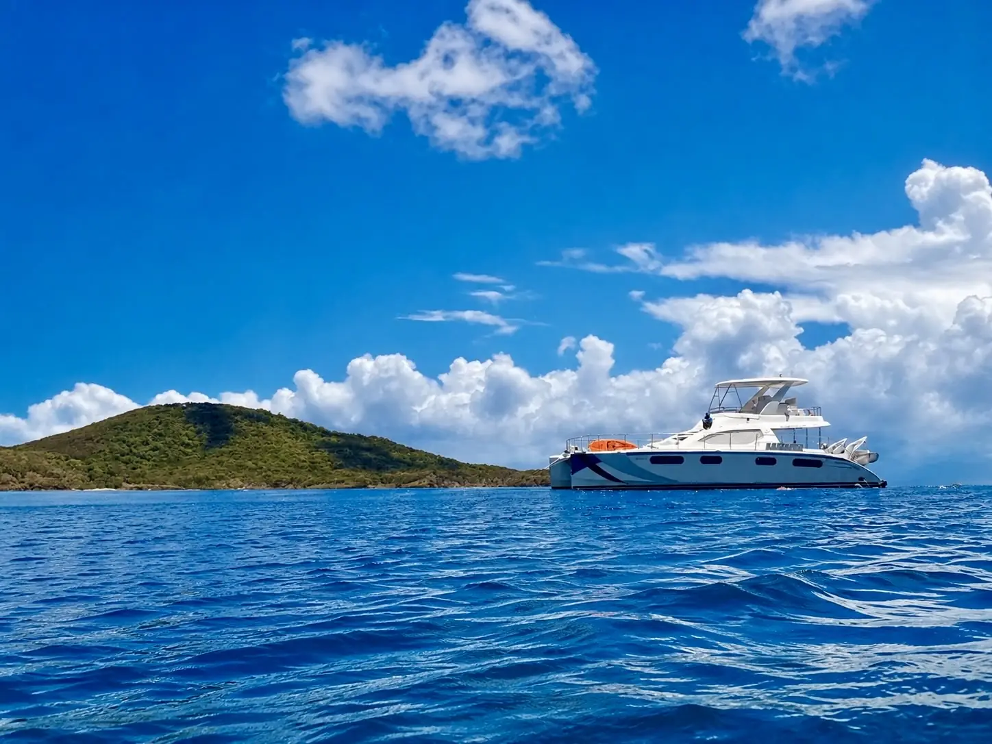 A 47-foot power catamaran on clear blue water off Fajardo, Puerto Rico