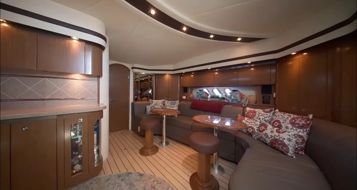 Air conditioned salon interior of the 54-foot luxury cruiser yacht with seating and staterooms